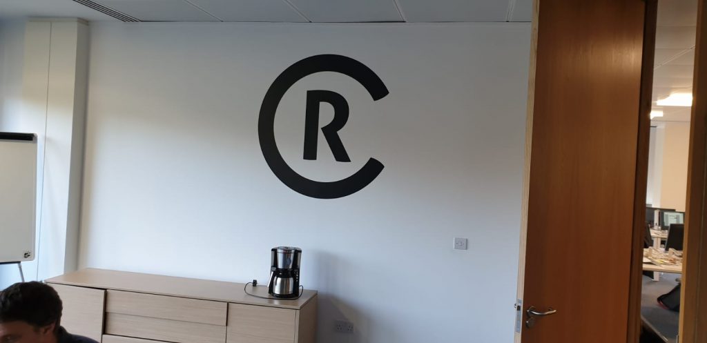 A logo cut from printed vinyl for Creative Race in Leeds