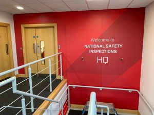 hallway covered in printed graphics